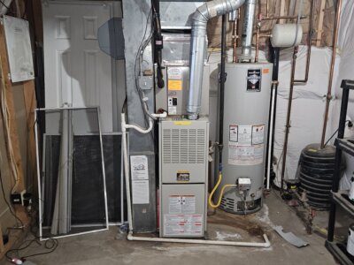 A picture of a hot water heater and hvac system.